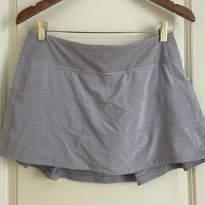 Lululemon skort 13” with inside pockets. Excellent condition like new.